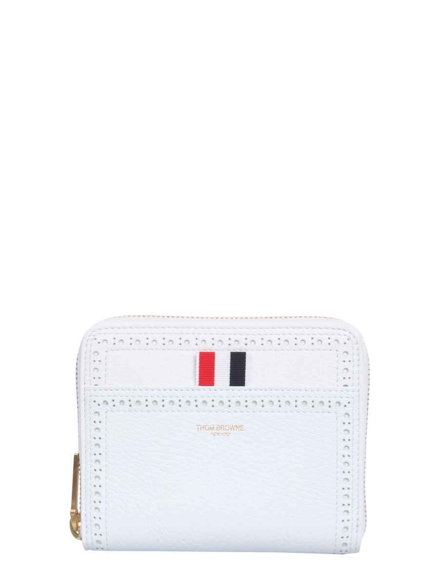 THOM BROWNE    LEATHER WALLET WITH ZIPPER AND BROGUING DETAILS